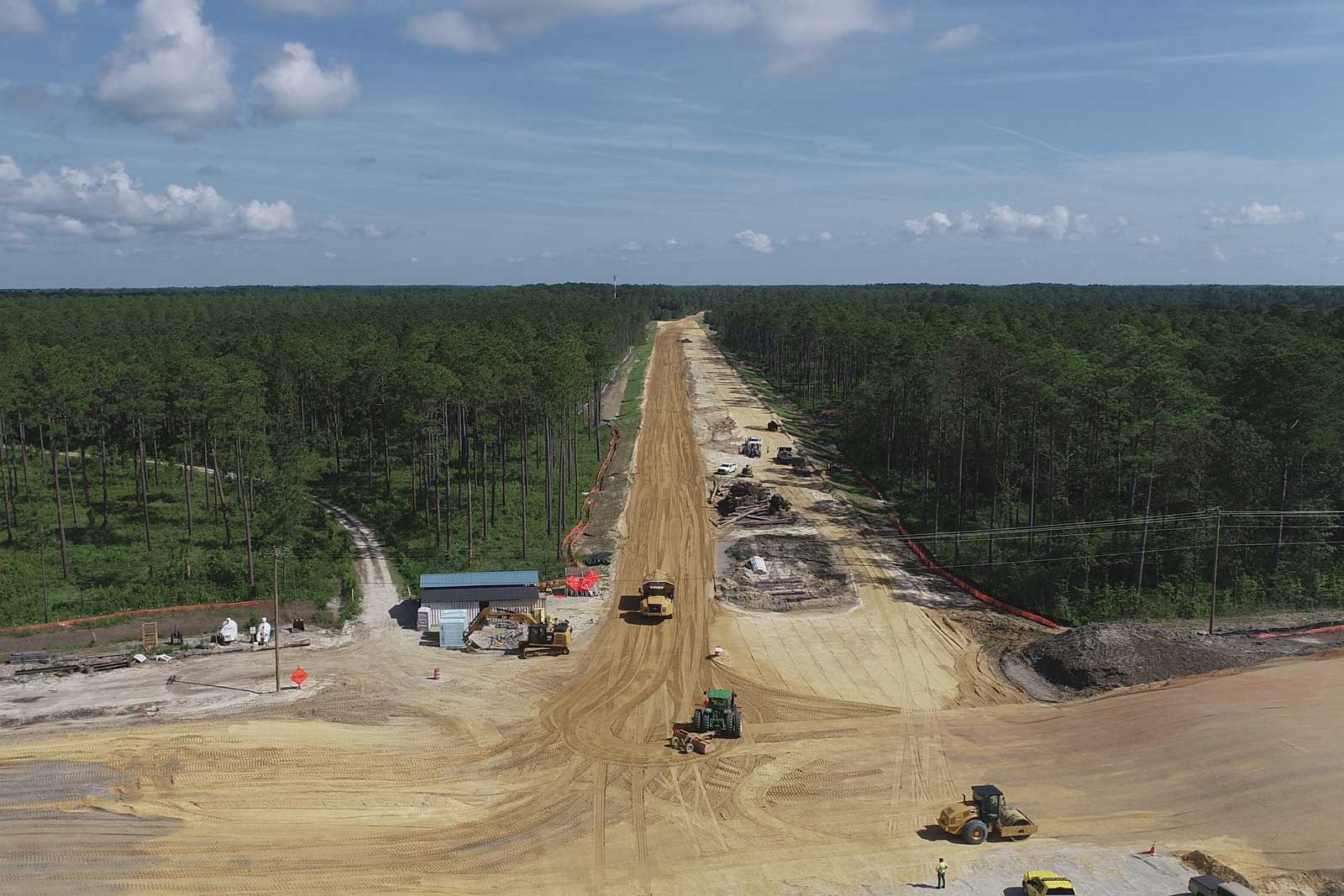 Grading and hauling operations are underway on the new alignment of the bypass. This is looking north from Sunset Drive.